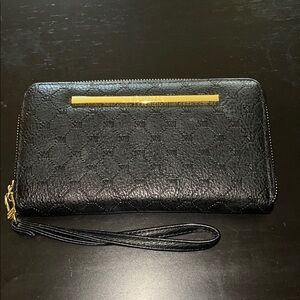 Steve Madden Black and Gold wristlet/Wallet with Textured Faux Leather